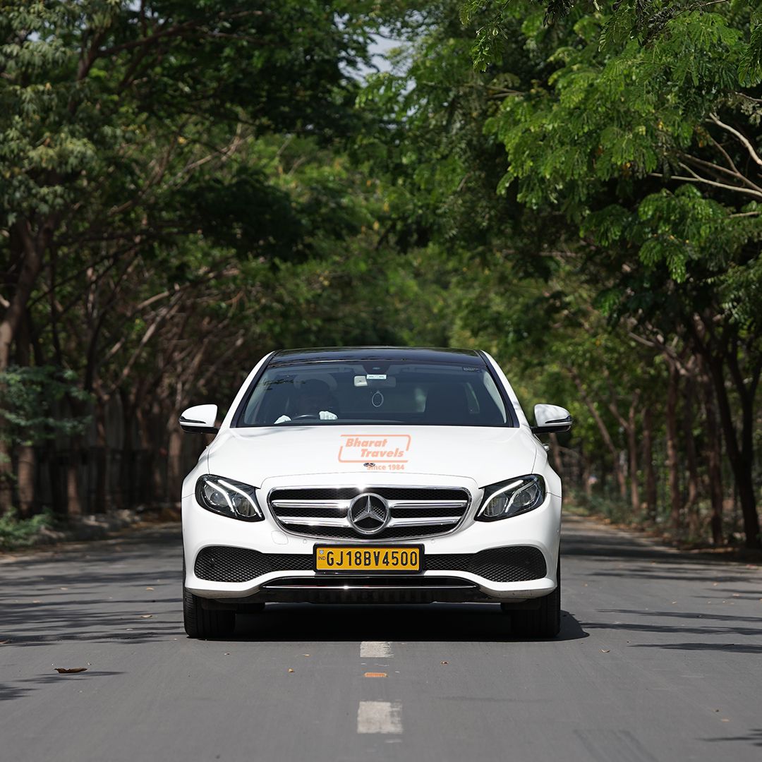 Innova car rental for airport pickup and drop in Ahmedabad